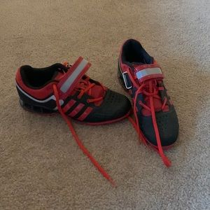 Size 6 mens weightlifting adidas red and black shoes.